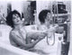 Dayle Haddon Washing Leg in Bath Photo Print - Elegant home decor