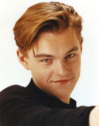 Close-up portrait photo print of Leonardo DiCaprio on a white background.