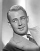 Alan Ladd leaning pose black and white photo print
