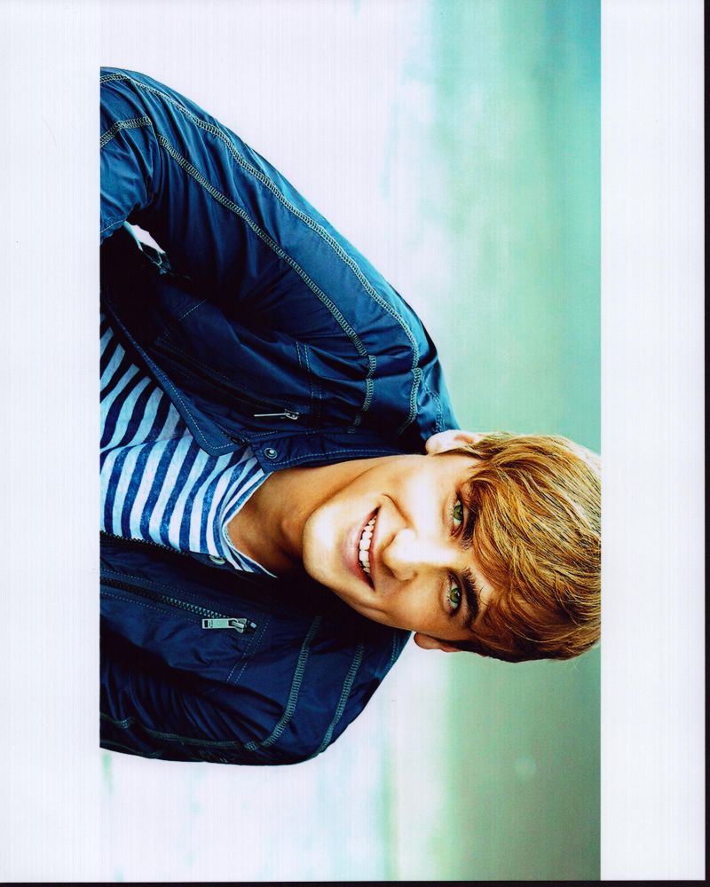 Kendall Schmidt in striped shirt photo print, available in multiple sizes.
