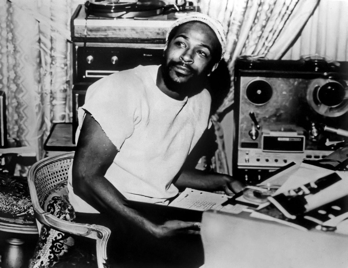Marvin Gaye sitting portrait photo print, showcasing the legendary musician.