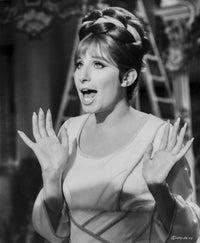 Barbra Streisand looking amazed in a white dress photo print