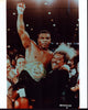 Don King holding Mike Tyson wearing a championship belt photo print.