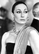 Anjelica Huston classic portrait photo print looking away with earrings and necklace.