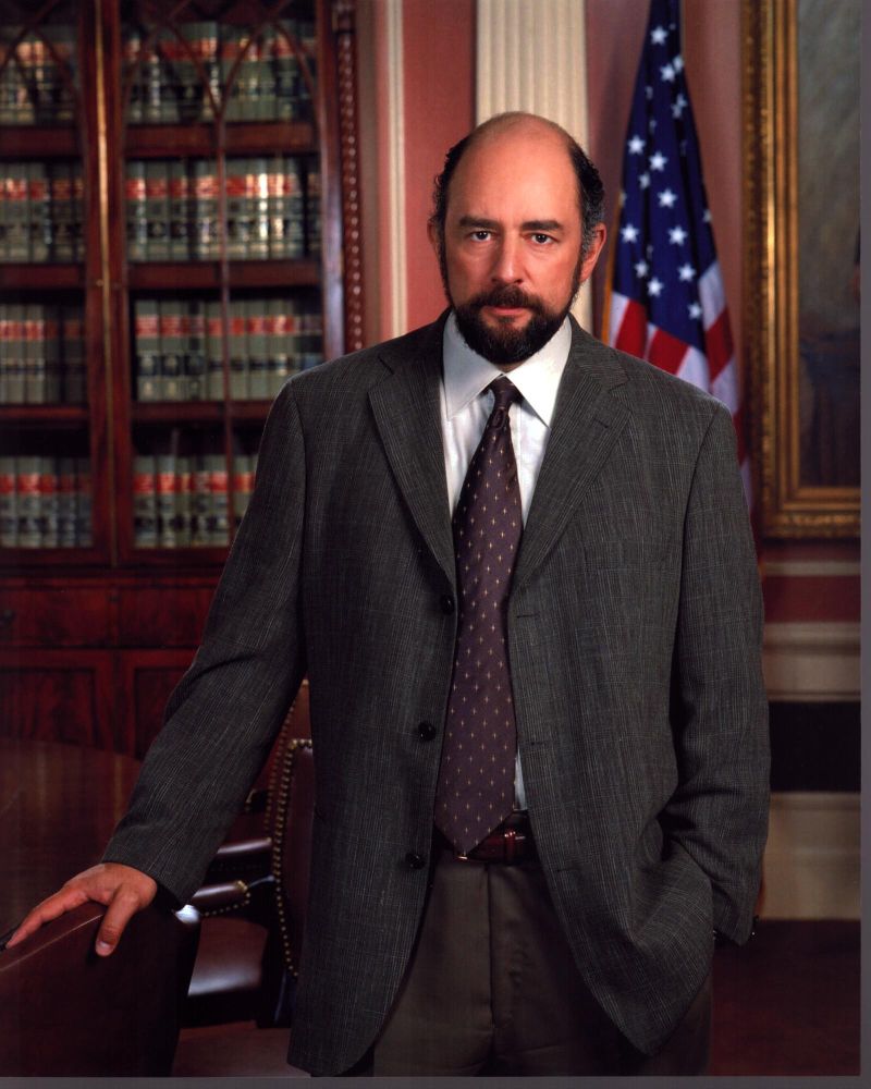 Richard Schiff leaning on a chair photo print from The West Wing