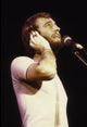 The Bee Gees singing photo print showcasing the iconic trio.
