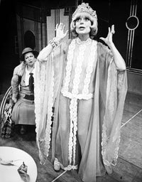 Carol Channing photo print wearing an embroidered dress and crown.