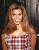 Danielle Fishel smiling in red plaid dress photo print.