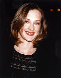 Joan Cusack smiling photo print - vibrant and charming.