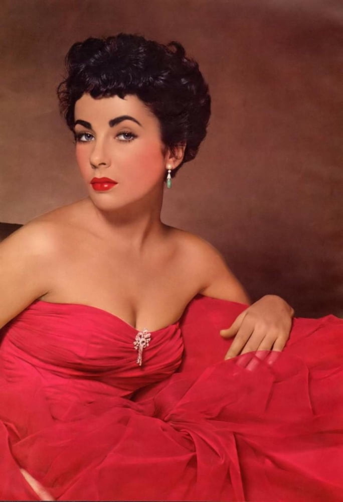Elizabeth Taylor sitting in a red dress photo print