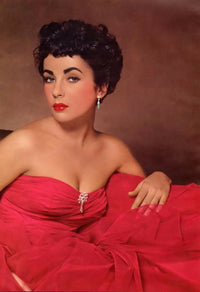 Elizabeth Taylor sitting in a red dress photo print