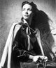 Jennifer Jones holding a holy rosary photo print.