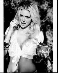 Kate Upton black and white photo print in tied top holding drink