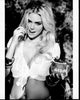 Kate Upton black and white photo print in tied top holding drink