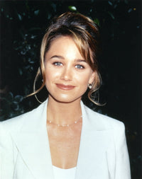 Christine Taylor posed in white coat portrait photo print