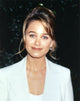Christine Taylor posed in white coat portrait photo print
