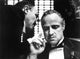 The Godfather Movie Poster Print Collection featuring iconic film stills.