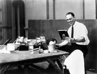 Lon Chaney in disguises on a film set photo print