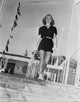 Ginger Rogers photo print featuring her curly hair and black mini skirt.