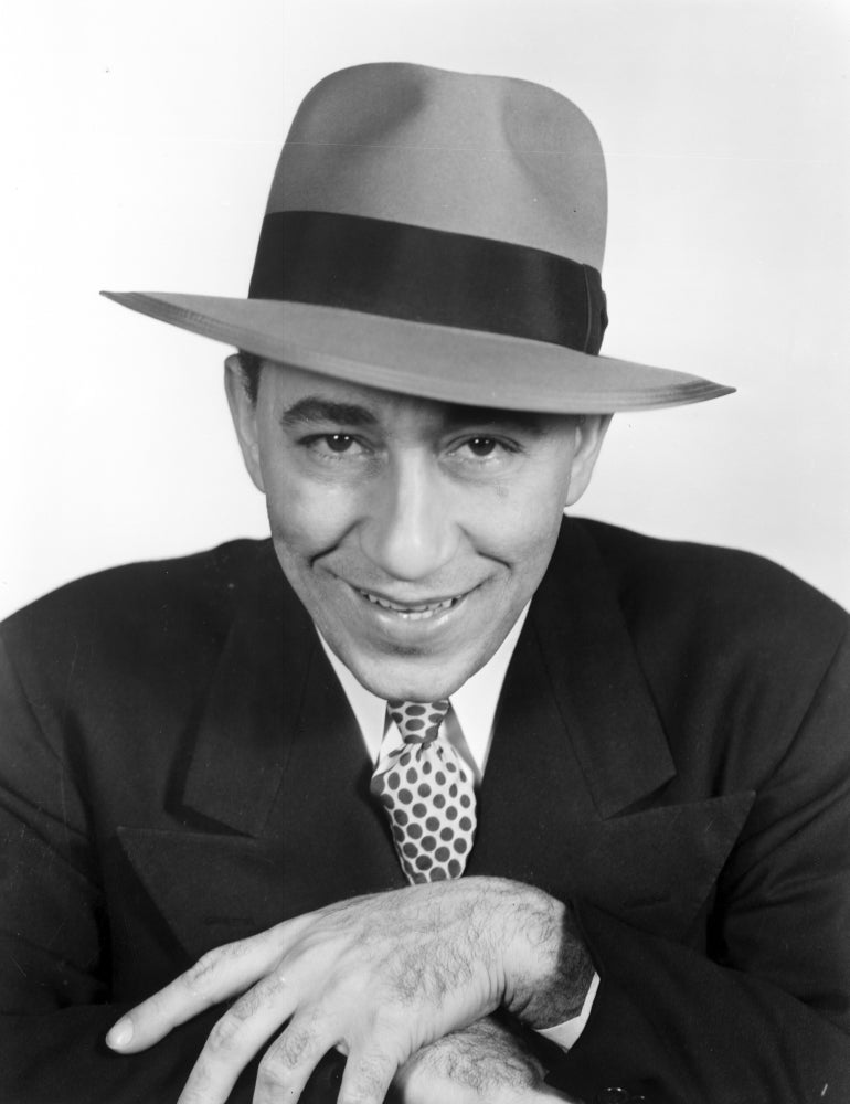 Close-up portrait photo print of Louis Prima, jazz singer.