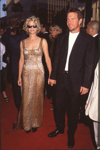 Meg Ryan in animal print dress with Dennis Quaid in black suit photo print