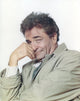 Peter Falk portrait print in gray coat with white background.