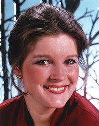Kate Mulgrew smiling in a red dress portrait photo print