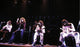 Live performance photo print of Led Zeppelin, capturing rock history.