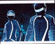 Daft Punk Glowing Helmets Photo Print showcasing iconic illuminated helmets.