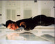 Tom Cruise suspended above floor in Mission: Impossible photo print.