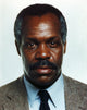 Close-up portrait photo print of Danny Glover wearing black tie.