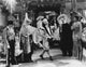Marx Brothers costume party photo print showcasing classic cinema humor.