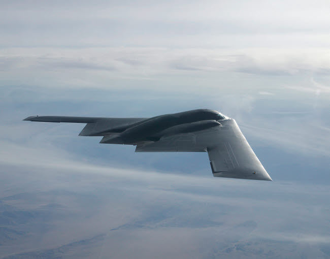 A B-2 Spirit Soars Through the Sky Fine Art Print by Stocktrek Images