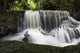Waterfall in Secret Buddha Garden Fine Art Print by Keith Levit