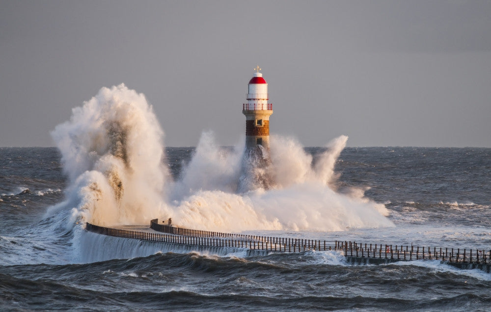Waves Splashing Against Roker Lighthouse Fine Art Print by John Short