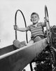 Boy on Slide at Playground Fine Art Print