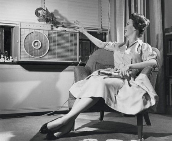 Young Woman Operating Air Conditioner Fine Art Print