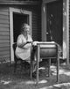 Senior Woman Churning Butter Fine Art Print