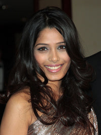 Freida Pinto DGA Awards Photo Print by Adam Orchon | Posterazzi
