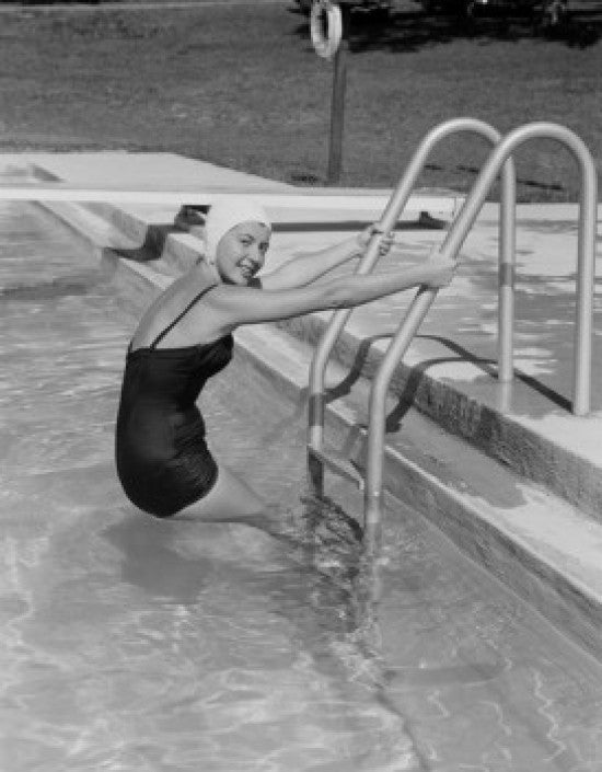 Young Woman Exiting Swimming Pool Fine Art Print