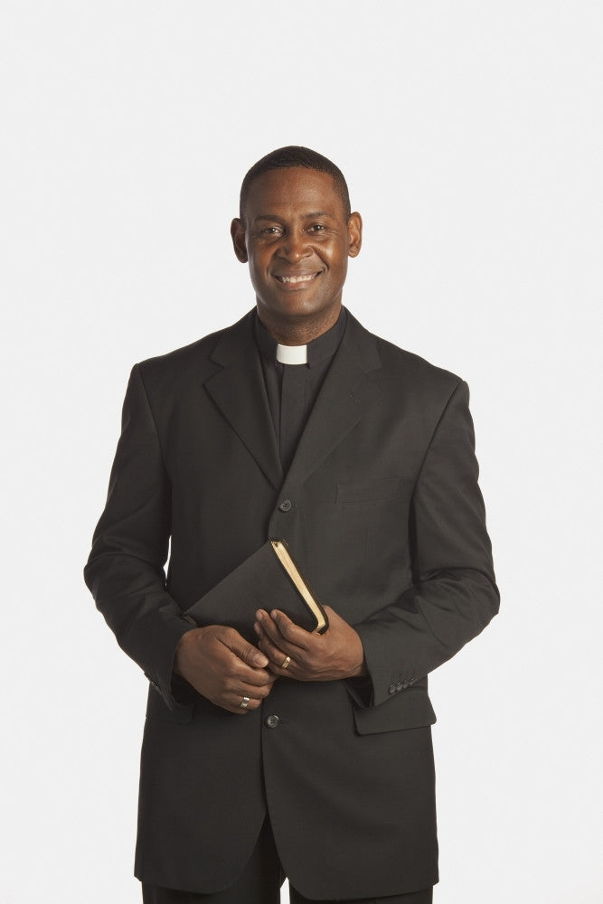 A Man in Clerical Collar with Bible Fine Art Print by Ron Nickel