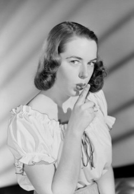 Studio Portrait of Young Woman Gesturing Silence Fine Art Print