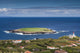 Ponta do Topo Lighthouse and Ilheu do Topo Island Fine Art Print by Walter Bibikow