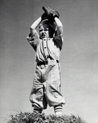 Low Angle View of a Boy Playing Baseball Fine Art Print