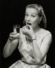 Portrait of a Young Woman Taking a Pill Fine Art Print