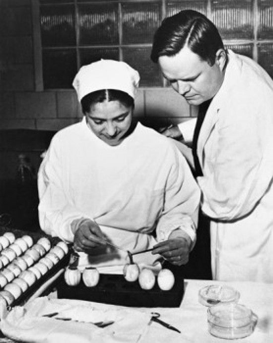 Male Doctor and Female Nurse Preparing Flu Vaccine Fine Art Print