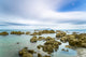 Rocks in the Ocean at Pukerua Bay Fine Art Print by Stuart Corlett