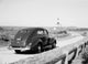 USA New York Car Approaching Montauk Point Lighthouse Poster Print