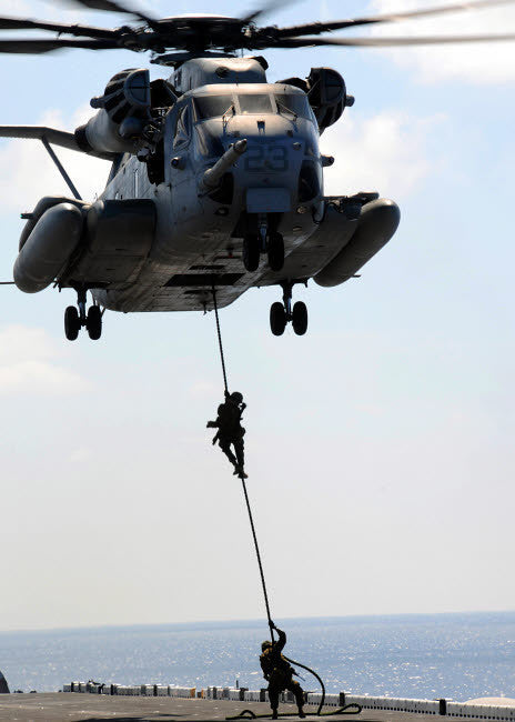 Marines Rappelling from CH-53E Sea Stallion Helicopter Fine Art Print by Stocktrek Images