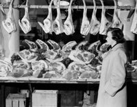 Woman in Butcher's Shop Fine Art Print - Multiple Sizes Available